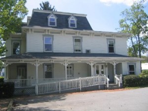 fe4160fa-d15d-44fa-aed6-2c441c420829 Former home of The Millbrook Round Table, on the corner of Merritt Avenue and Front Street in Millbrook, NY.